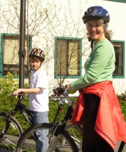 Pamela Williams biking with Ian.
