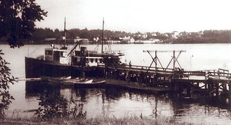 The Catalyst docked at the Labs in the 1930s, with the little village of Friday Harbor in the background.