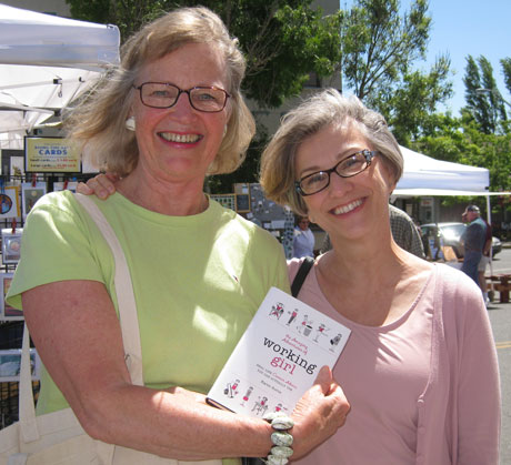 Publicist Alice Acheson (left) and Karen Burns show off the new book....