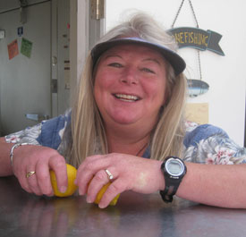 Brenda is always smiling at Friday Harbor Seafood...