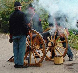 Battery D fires their cannon...