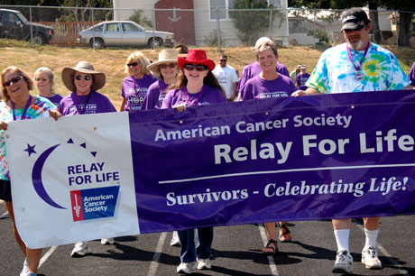 Relay for Life 2009 got started with the survivors' lap, and a lot of smiles in the sun...(photo by Janice Peterson)