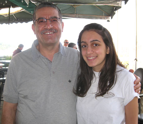 Maloula's owner Adnan Nassrallah has his daughter Roula working this summer at the restaurant....