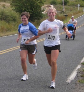 Talia Loucks (left) and Lilly Price smile the miles away...