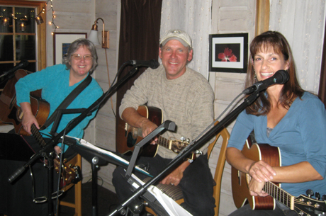 Kate (left) and Tom & Tami, raisin' it at the Place