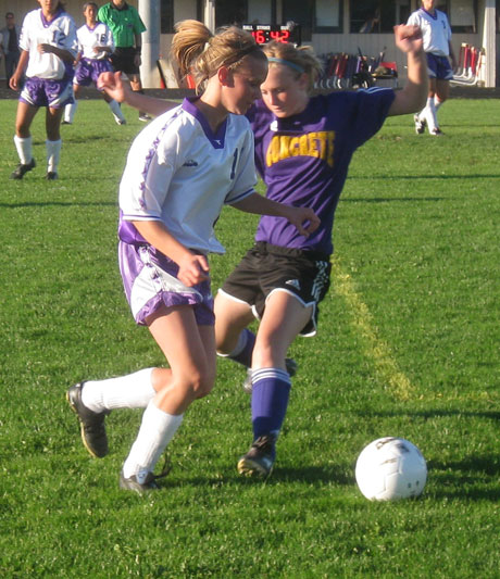 FHHS sophomore Mandy Turnbull turns the corner on the Lions' defender in the second half of the Wolverines' 9-0 victory.