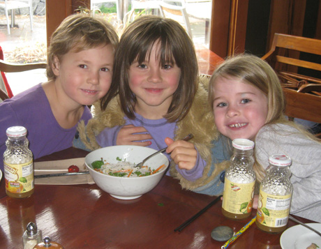 That's Indigo, Lilah, and Olivia with their noodles at the Backdoor Kitchen...