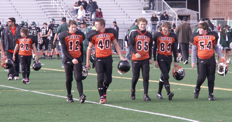 After the game on Oct. 24th, the Junior Tigers leave the field: Defensive coach Fred Woods exits the field with (from left to right) Dusty West, Alex Kurtz, Nate Steenkolk, Austin McDiarmid, Austin Hargrove and Coleton Cartmill.  