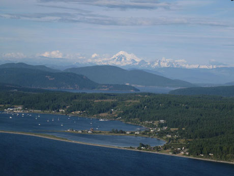 Our island home looks beautiful from the sky, too. Although, that's Lopez with Mount Baker in the background. You can tell it's Lopez Island - not as many tourists....