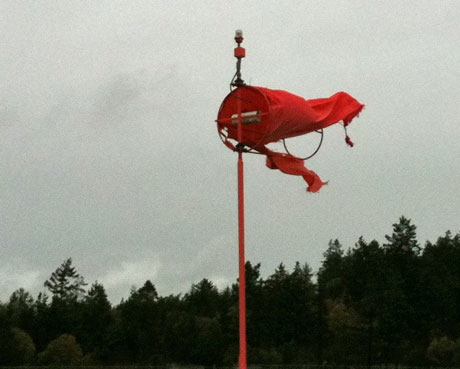 The windsock at Friday Harbor Airport flew in tatters on Thursday after taking a beating the night before...photo by Chris Teren, who didn't fly that day.