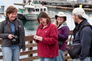 That's Sandy (left), Mary Kate, Susan, and Tim shooting practice shots down at the marina at the last Photo Club meeting, last month. Photo by Aaron Shepard.