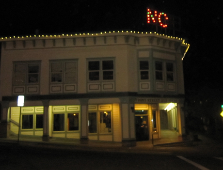 The answer to the question, "Is the Ale House open?" is clearly lit up in what's left of the "Noel" display on top of the building.
