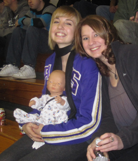 That's Mari & Katie with Kayla's baby (see below) at the FHHS game last week....