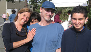 That's Marc about a year ago at Farmer's Market with partner Taylor Bruce and kids Rory (kinda hiding) and Zach.