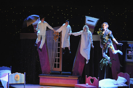 They really can fly! John (Robin Lohrey), Michael (Max Heinel), Wendy & Peter take to the night air...photo by James Krall.