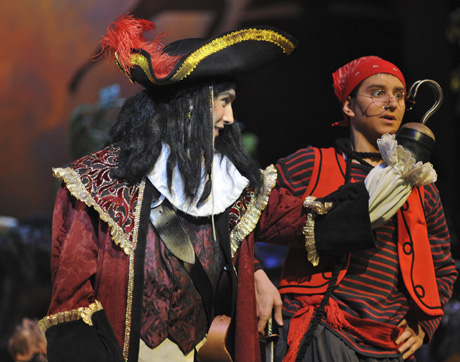 Captain Hook (Parks Barnard) schemes with Schmee (Sam ASher) about how to get Peter Pan...photo by James Krall.