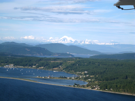 This is why we're on the list...this is a photo of Mount Baker, looking past Lopez Island that I took from the air...beautiful place we live, eh?