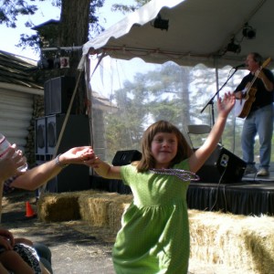 And I knew that if I got the chance, that I could make those people dance....that's Greta three years ago at the Fair,  dancin' to the one man band.