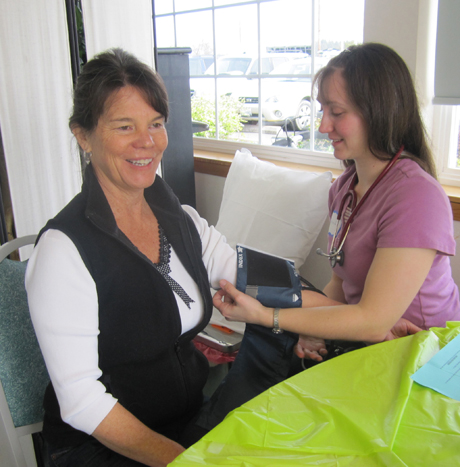 That's Cynthia getting her blood pressure taken by Amanda from San Juan Healthcare at the Health Fair on Saturday....