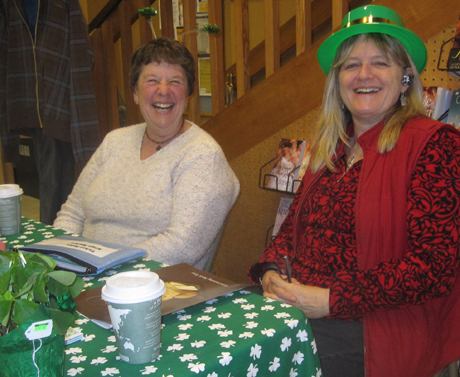 Soroptimists Lori & Lynn have fun selling tickets for Saturday's dinner & auction....