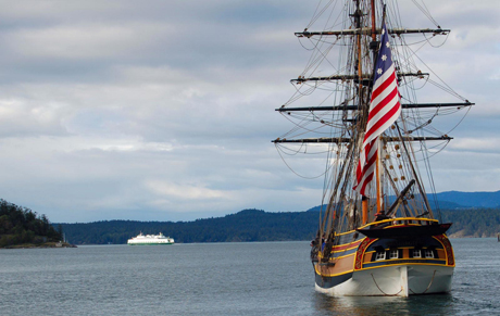 The Lady Washington heads out of the marina as the fery comes in....