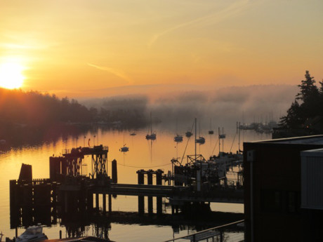 A gorgeous sunrise over a placid Friday Harbor in the early mist of Saturday morning - Alice Hurd photo