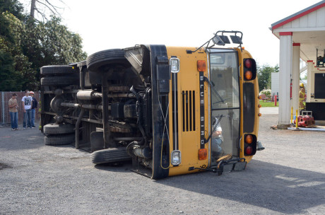 Overturned school bus gives our emergency people good practice for their drill on Saturday morning
