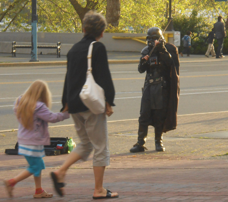 Yep, that's Darth Vadar playing the violin for tips, downtown on a sunny weekend day....