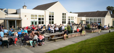This was the scene at the final Community Dinner of the season, an outdoor BBQ, last Wednesday - Do you see yourself in the photo?