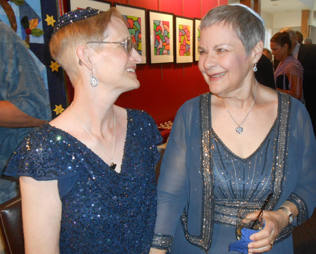 Judy (left) and Ellen enjoy the reception in the Theatre's lobby with music, food, cake & friends & family. (Photo by Ian Byington)