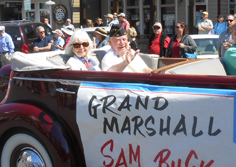 Longtime islander Sam Buck (with Barbara) served as the parade's Grand Marshall for 2013.
