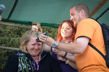 Shelley is about to lose all her hair at the hands of Mike Scott and Shawnna Vert