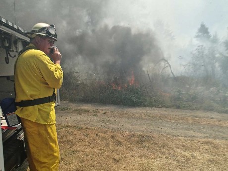Fire Chief Steve Marler coordinating initial attack on the wildland fires on Tuesday - Ron Garner photo