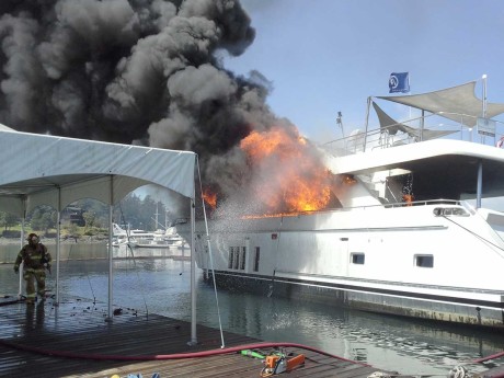 85 foot Ocean Alexander yacht burns at Roche Harbor marina - Kevin Holmes photo