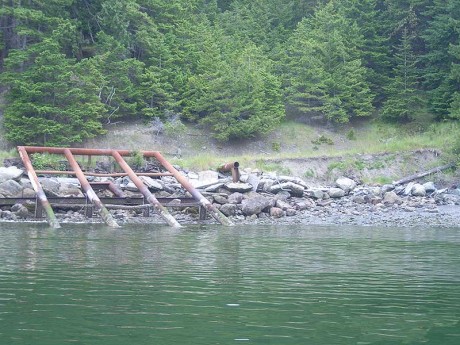 Before: No longer needed to support forestry operations, this log handling facility and 110 dump truck loads of rock and associated fill was removed from the north Thatcher Bay beach on Blakely Island.