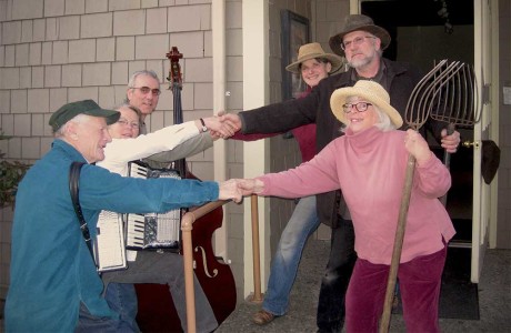Grange members (right) welcoming community musicians (left) to the Hall,   (left to right): Mike Cohen, Lee McEnery, Ken Arzarian, Valerie White, Roger Ellison, and Alice Deane - Click for larger version - Contributed photo