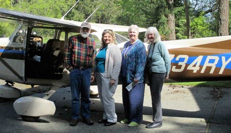 Pictured are Ed Kelm, pilot, Kim Abel LWVWA President, Pat Dickason, Vice-President and Lobby Team Chair, and Raelene Gold, League Natural Resources Lobbyist - Click for larger version - Contributed photo