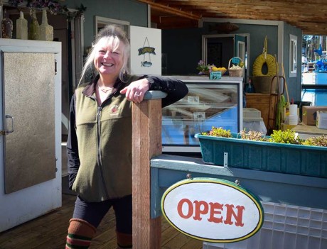 Brenda is happy to be open again down on the floating fish store (Eric was  unavailable for the photo, as he was busy working on a last minute project on their opening day)