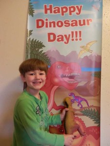 John and the Dino poster - Click to enlarge - Contributed photo