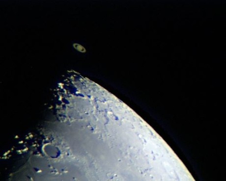 Saturn positioned just over the edge of the moon - Paul Walsh photo