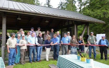 Dignitaries and current and past County officials join Council Member Jamie Stephens and Parks Director Dona Wuthnow in cutting the ceremonial ribbon at the "Rediscover Odlin" Celebration - Click to enlarge - SJCounty Staff photo
