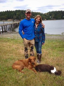 Erik and Andrea with their dogs, golden retriever Henry and springer spaniel Harley. The dock is still being repaired but will open later this summer. In the meantime, dinghies may pull up on the beach in an area marked by red flags. - Louise Dustrude photo