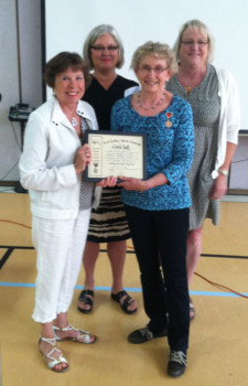 Nancy Fusare, Kiwanis Secretary, hands Connie her award along with Kiwanis President, Stephanie Johnson-O'day and memberLisa Anderson - Contributed photo