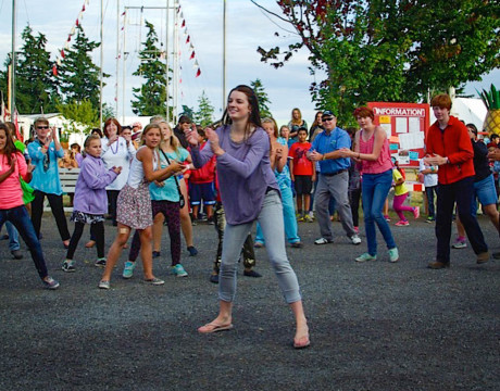 Julie Hagn leads the Happy Flashmob - Debbi Fincher photo