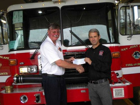 Steve Marler, San Juan Island Fire Rescue Chief, receives New Fire Engine - Sheila Harley photo