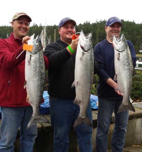 Wow ~ Surdyk Father and son Team from Snohomish ~ scored big time ~ with a 19.6 oz. 3rd Place and 64.3 oz in total boat weight to stuff a total of 5G  into their pockets! L-R: Larry Surdyk,  Michael Surkyk, (3rd place angler) and Jason Hennig - Contributed photo