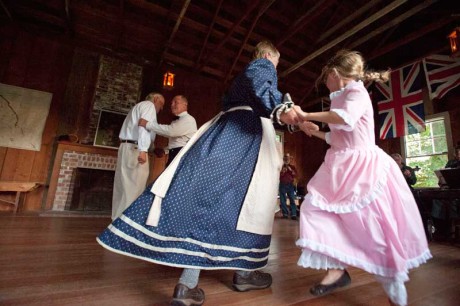The Candlelight Ball features dancers in period dress, but everyone is welcome - Contributed photo