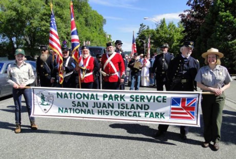 Lee Taylor (right) leads the park's historic color guard in Friday Harbor's annual Fourth of July Parade - Contributed photo
