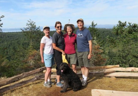 San Juan Islanders Julie Gralow and Val Gorder take friends Sally Jewell (U.S. Secretary of the Interior) and husband Warren Jewell on a hike to the Mount Grant summit - Contributed photo