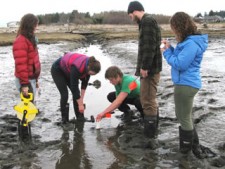 Students sampling coastal marsh - Image courtesy of Kwiaht